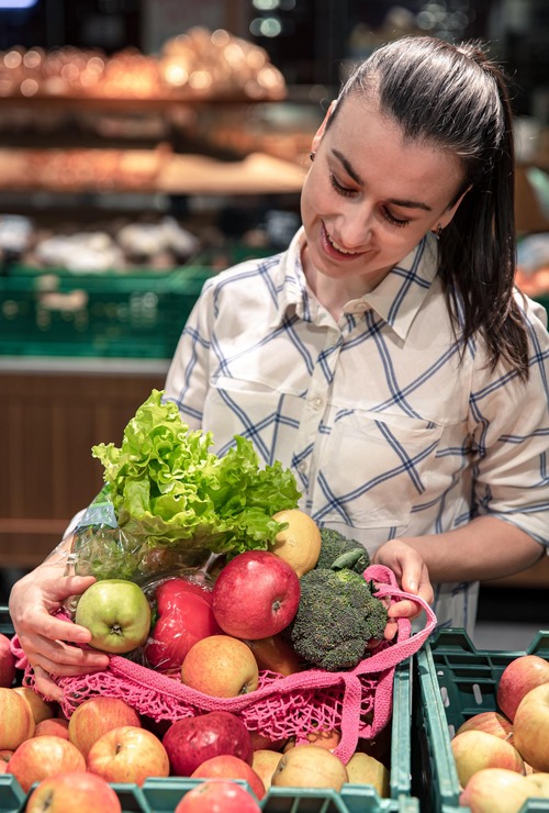 Woman choosing fresh produce